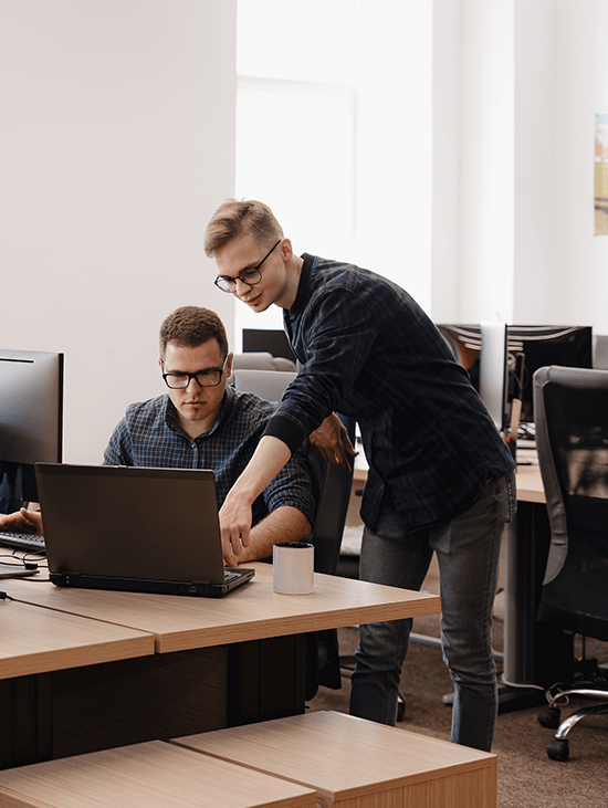 group-of-young-business-people-working-in-the-office-550x731